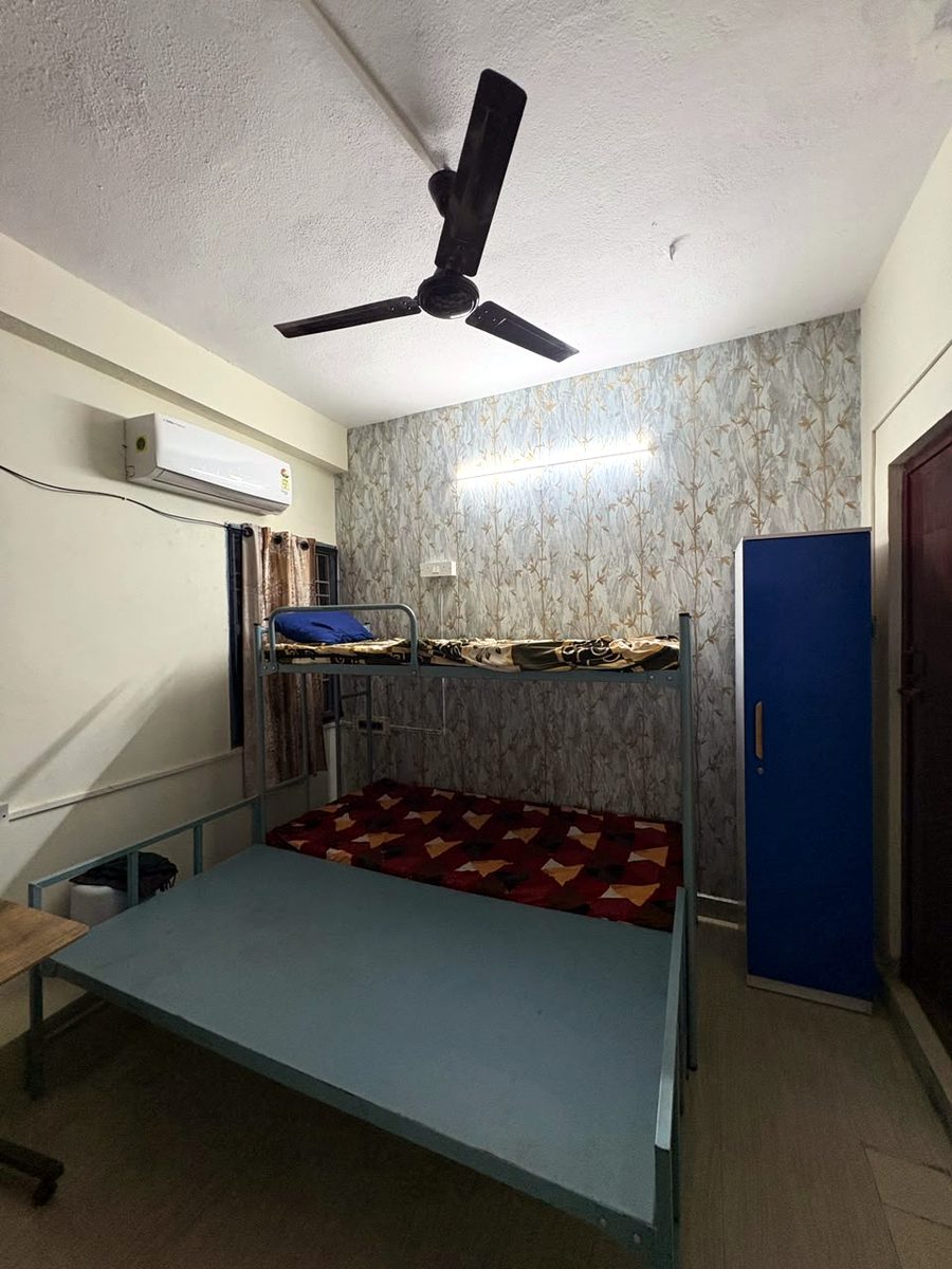 AC room with wardrobe and bunk cot